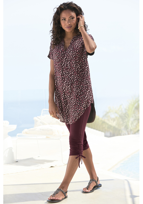 Bild: Longshirt von Beachtime: Langes Blusenshirt von Beachtime. Vorderteil aus allover gemusterter Webware, Rückseite aus unifarbenem Jersey. Tunikaausschnitt mit Blende. Kurze, überschnittene Ärmel. Gerundeter Saum. Weiche, nachhaltige Viskose