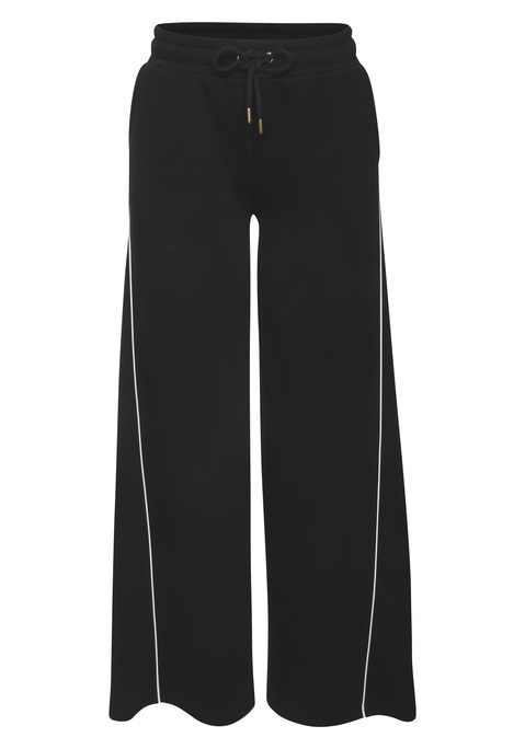 Bild: Sweathose von Buffalo: Relaxte Sweathose von Buffalo zum Loungen. Weites Bein mit seitlichem Piping als schönem Detail. Elastischer Bund mit Kordelzug sowie elastische Bündchen. Ideal zum Entspannen zu Hause. Hochwertige Sweatqualität aus einer Baumwollmischung.