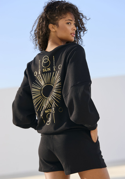 Bild: Sweatshirt von Buffalo: Sweatshirt von Buffalo. Rundhalsausschnitt und Rippbündchen. Extrastark überschnittene Schulternähte. Großer Rücken-Print mit Glanz-Effekt. Lockere Passform. Softe Sweatware.