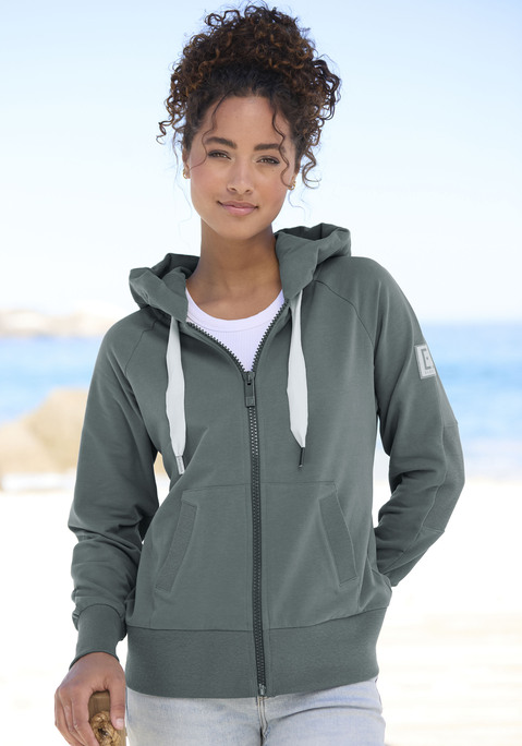 Bild: Kapuzensweatjacke von Elbsand: Lässiges Kapuzensweatshirt von Elbsand. Große Kapuze mit Tunnelzug und plakativem Labelschriftzug. Lange Ärmel mit überschnittenen Schultern. Breite Saumbündchen. Praktische Eingrifftaschen. Weiche, wärmende Sweatqualität.