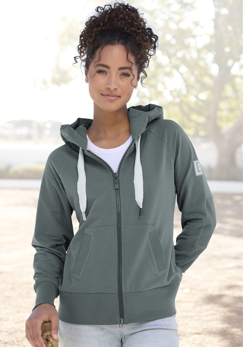 Bild: Kapuzensweatjacke von Elbsand: Lässige Kapuzensweatjacke von Elbsand. Große Kapuze mit Tunnelzug und plakativem Labelschriftzug. Lange Ärmel mit überschnittenen Schultern. Breite Saumbündchen. Praktische Eingrifftaschen. Weiche, wärmende Sweatqualität.