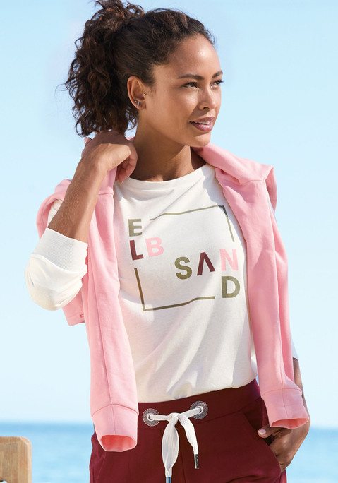 Bild: Langarmshirt von Elbsand: Lässiges Langarmshirt von Elbsand. Highlight: der weit geschnittene Rundhalsausschnitt. Mit überschnittenen Schultern und großem Logodruck vorn und kleinem im Nacken. Geräumige Oversize-Form, ideal für Casual-Looks. Anschmiegsame Jerseyqualität mit Baumwollanteil.