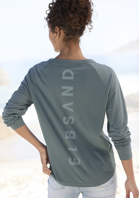Bild: Longsleeve von Elbsand: Bequemes Longsleeve von Elbsand. Rundhalsausschnitt. Langärmeliges Modell. Rückensaum abgerundet. Rückseite mit Logodruck. Figurumspielende Passform. Leicht kombinierbar mit Freizeitlooks. Weicher Baumwoll-Mix.