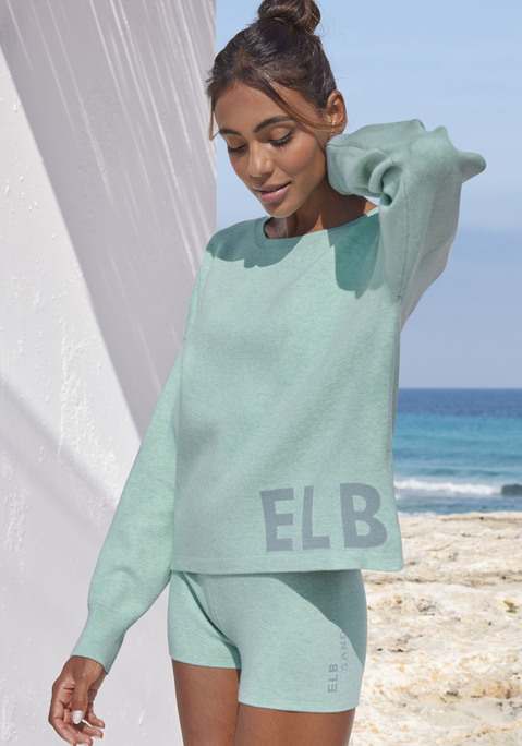 Bild: Strickhose von Elbsand: Kurze Strickhose von Elbsand. Eingestricktes Markendetail. Weiches Komfortbündchen. Schmale Radler-Passform. Elastisch und komfortabel zu tragen. Strickqualität mit Viskose-Anteil.