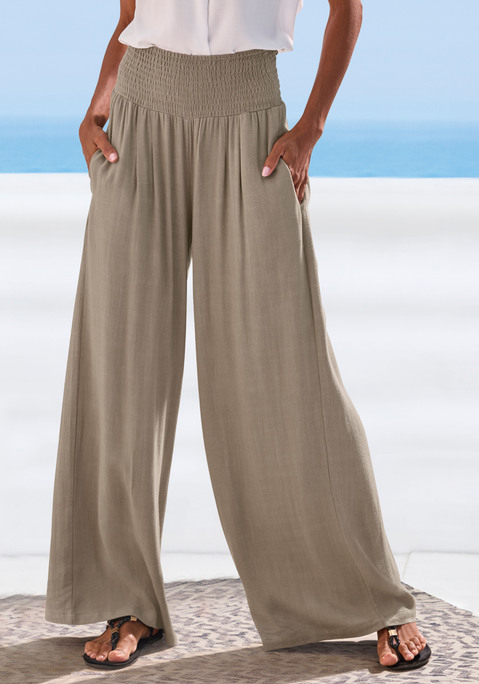 Bild: Leinenhose von French Connection: Strukturierte Leinenhose von French Connection. Highlight: der elastische, geraffte Bund. Weit geschnittene Passform. Ideal für den Basic-Look im Alltag und auch als Homewear. Schön zu engen Oberteilen. Weich fließende Viskose mit Leinenanteil.