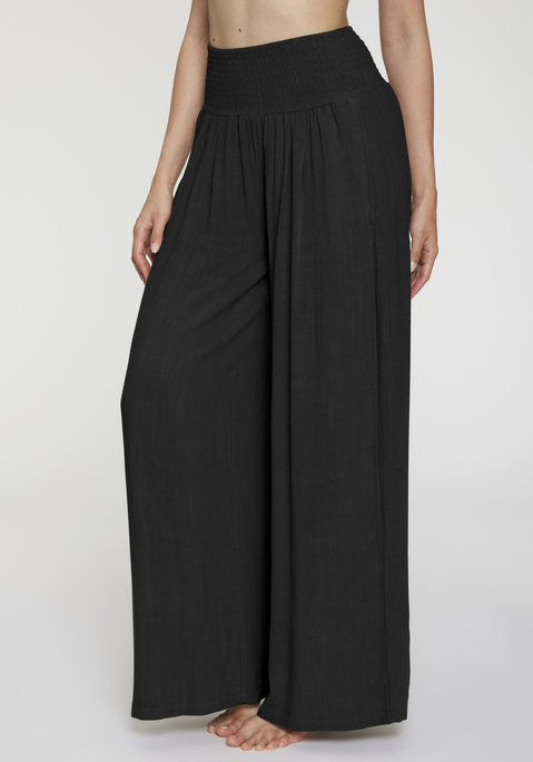 Bild: Leinenhose von French Connection: Strukturierte Leinenhose von French Connection. Highlight: der elastische, geraffte Bund. Weit geschnittene Passform. Ideal für den Basic-Look im Alltag und auch als Homewear. Schön zu engen Oberteilen. Weich fließende Viskose mit Leinenanteil.