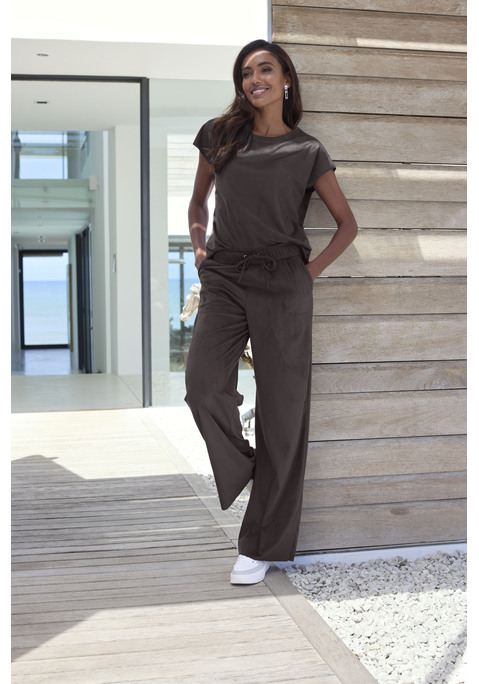 Bild: Schlupfhose von French Connection: Bequeme Schlupfhose von French Connection. Mit weichem Schlupfbund und weit geschnittenen Beinen. Elastisches Velourslederimitat mit weichem Griff.