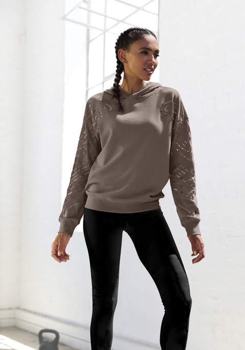 Bild: Hoodie von LASCANA ACTIVE: Kapuzenshirt von Lascana Active mit extravagantem Muster an den Schultern und Armen.  Rippbünchen an Saum und Ärmeln. Weiche Sweatqualität mit Baumwollanteil.
