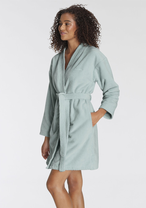 Bild: Bademantel von LASCANA: Bademantel im Kimono-Schnitt in Kurzlänge mit Längssteppungen an den Ärmelabschlüssen mit losem Bindegürtel an der Taille. Aus 60% Baumwolle, 40% Polyester.