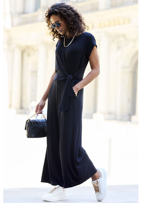 Bild: Culotte-Overall von LASCANA: Jumpsuit von Lascana mit taillierendem Knotendetail. Runder Ausschnitt mit Knopfverschluss hinten. Kurze Ärmel. Gummizug auf Taillenhöhe. Seitliche Eingrifftaschen. Aus weichem Viskosestretch.