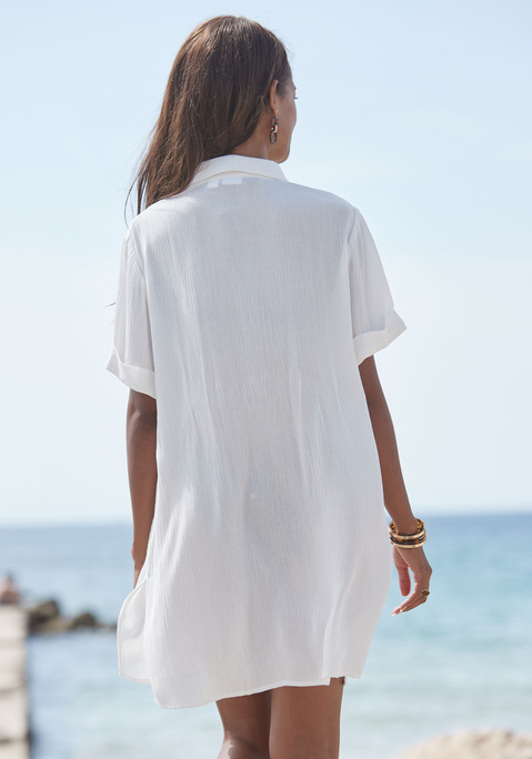 Bild: Longbluse von LASCANA: Lässige kurzärmelige Longbluse von Lascana im unifarbenen Design. Mit Hemdblusenkragen und durchgehender Knopfleiste vorn. Seitliche Saumschlitze. Vielseitig kombinierbar. Trageangenehme Crêpequalität aus weicher Viskose.
