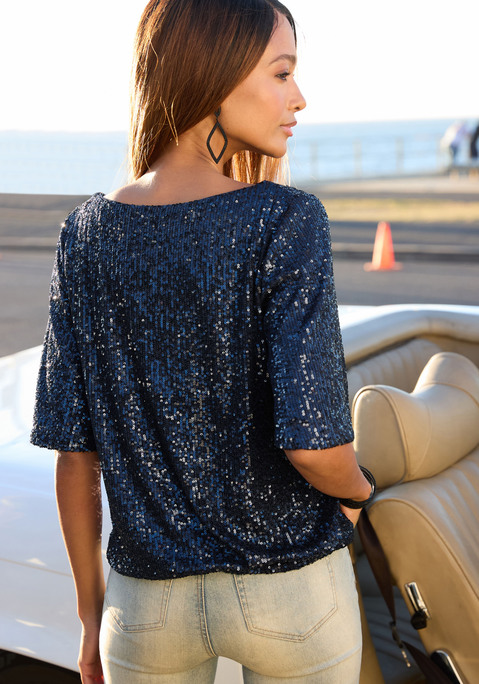 Bild: Paillettenshirt von LASCANA: Schöner Eye-Catcher: Shirt von Lascana mit Pailletten und weitem Rundhalsausschnitt. Halblange Ärmel. Gerader Saum mit Dehnbündchen. Figurumspielende Passform. Komplett gefütterte, dichte Meshware.