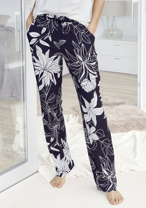 Bild: Schlafhose von LASCANA: Stoffhose von Lascana. Mit floralem Alloverprint. Ausgestelltes Bein. Hoher, elastischer Tunnelzugbund. Seitliche Eingrifftaschen. Weiche Single-Jersey-Qualität aus 50% Baumwolle, 50% Viskose.