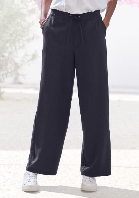 Bild: Schlupfhose von LASCANA: Unifarbene Palazzohose von Lascana. Bund mit metallisch glänzenden Ösen, Kordelzug und Gummizug hinten. Eingrifftaschen seitlich. Leichte Lyocell-Qualität.