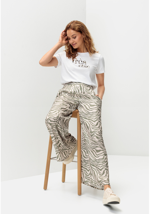 Bild: Webhose von LASCANA: Leichte Palazzohose von Lascana mit modischem Allovermuster. Glatter Bund vorn, elastischer Smokbund hinten. Seitennahttaschen. Weite Passform. Satinware mit weichem Griff.