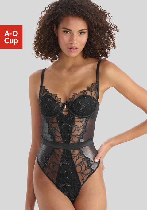 Bild: Stringbody von LASCANA: Edler Stringbody mit stützenden Bügeln. Aus leicht transparenter Spitze mit feinen Glitzerdetails und schimmerndem Soft-Mesh. Individuell verstellbare Träger sowie Rückenverschluss. Passender Strumpfhalter aus der gleichen Serie erhältlich. Mit Liebe & Leidenschaft in Hamburg kreiert. Sexy Dessous. Spitzen-Dessous. Romantische Dessous. Verspielte Dessous. Obermaterial: 66% Polyamid, 30% Polyester, 4% Elasthan.