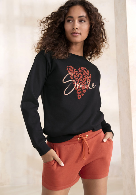 Bild: Sweatshirt von LASCANA: Sweatshirt von Lascana mit Rundhalsausschnitt. Herzförmiger Frontprint mit Inside-Leomuster. Rippbündchen an Ausschnitt, Ärmeln und Saum. Bequeme Passform mit leicht überschnittenen Schultern. Softe Baumwoll-Mix-Qualität.