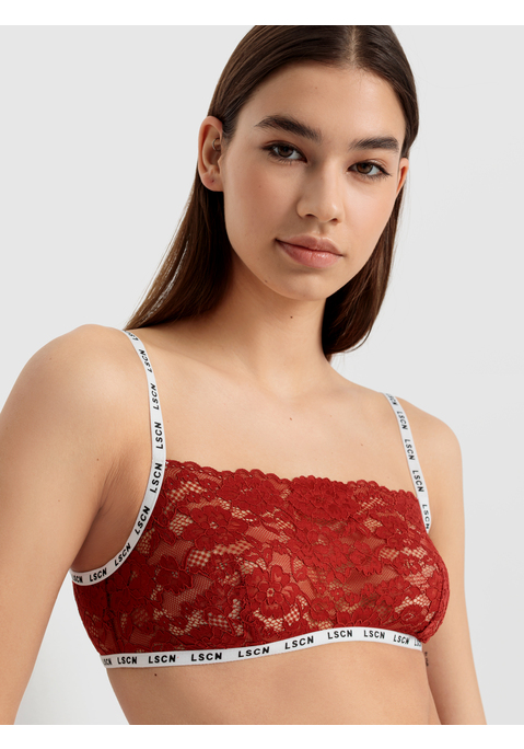 Bild: Bustier von LSCN by LASCANA: Hübsches Bustier von LSCN by Lascana aus floral gemusterter Spitze. Schmale Träger und Unterbrustgummi in Kontrastlook mit Logodrucken. Verschlussloses Design mit verstellbaren Trägern. Mittlerer Halt. Weiche, elastische Qualität.