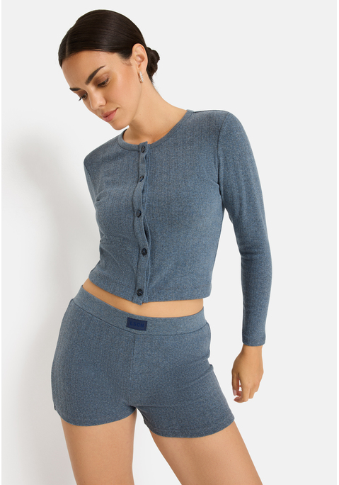 Bild: Hotpants von LSCN by LASCANA: Hotpants von LSCN by Lascana mit hübschem Ajourmuster. Elastischer Bund mit kleinem Markenlabel. Schön eng anliegend. Toll zu verschiedenen frechen Looks. Weicher, melierter Feinstrick.