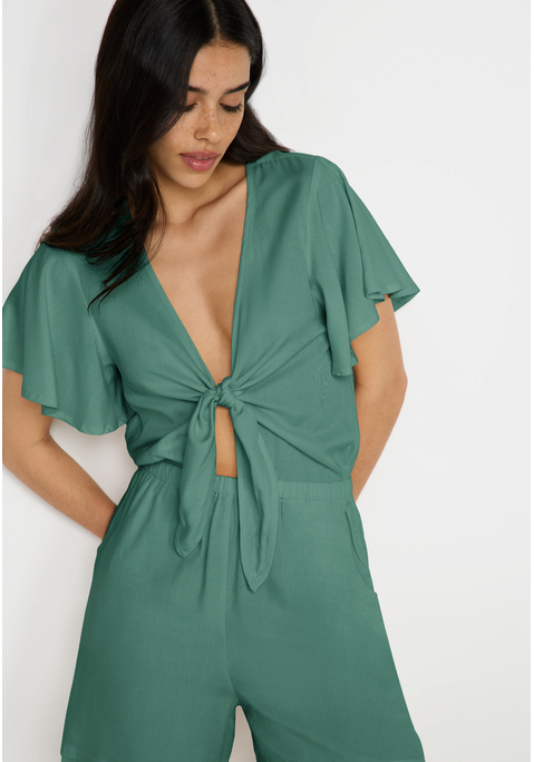 Bild: Kurzoverall von LSCN by LASCANA: Kurzoverall von LSCN by Lascana mit tiefem V-Ausschnitt und modischem Knotendetail vorne. Kurze Ärmel. Gummizug in der Taille. Aus gewebter Viskose.