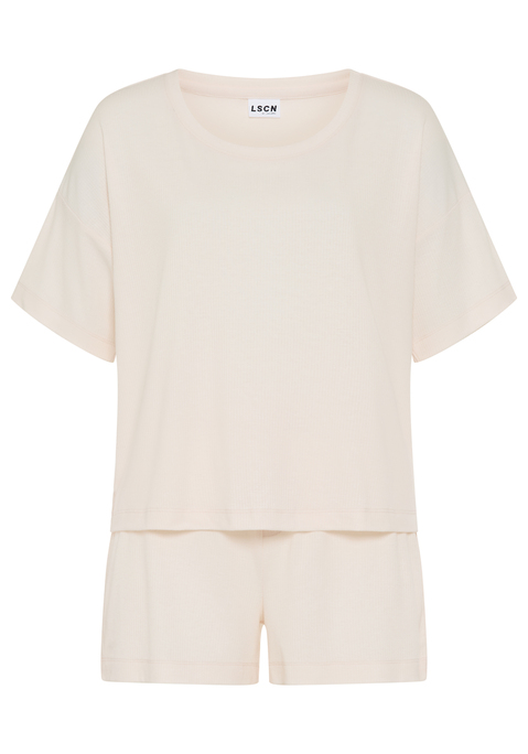 Bild: Shorty von LSCN by LASCANA: Lässiger Look, maximaler Komfort: Der Shorty von LSCN by Lascana bringt dich in den perfekten Chill-Modus. Das kurze, leger geschnittene Halbarmshirt mit überschnittenen Schultern bietet dir eine entspannte Passform, die dich nicht nur nachts, sondern auch beim Relaxen zu Hause begleitet. Die Shorts mit geradem Bein und einer kurzen Zier-Knopfleiste setzen ein süßes Detail und sorgen für einen coolen Look. Die weiche, elastische Rippqualität fühlt sich richtig angenehm auf der Haut an. Dadurch ist der Pyjama perfekt für gemütliche Abende. Kuschel dich ein und genieße den Komfort – mit dem Shorty von LSCN by Lascana.