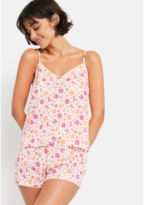 Bild: Shorty von LSCN by LASCANA: So comfy, so cute – der Shorty von LSCN by Lascana ist dein neuer Lieblingsbegleiter für entspannte Nächte und gemütliche Morgen. Das Top mit schmalen Trägern wirkt zart und feminin, während die Shorts mit elastischem Bund und kleiner Schleife nicht nur bequem, sondern auch charmant-verspielt daherkommen. Die angenehme Viskosequalität fühlt sich herrlich weich auf der Haut an und sorgt für ein rundum wohliges Tragegefühl, ob im Bett oder beim Chillen auf der Couch. Mach’s dir schön – mit dem Shorty von LSCN by Lascana.