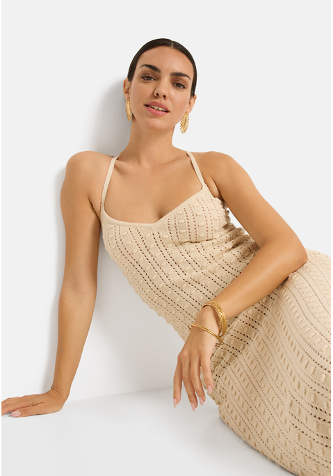 Bild: Strickkleid von LSCN by LASCANA: Modisches unifarbenes Strickkleid von LSCN by Lascana in Midilänge. Tiefer Rückenausschnitt mit gekreuzten Spaghettiträgern zum Binden. Tiefer V-Ausschnitt. Weicher, leicht transparenter Ajourstrick.