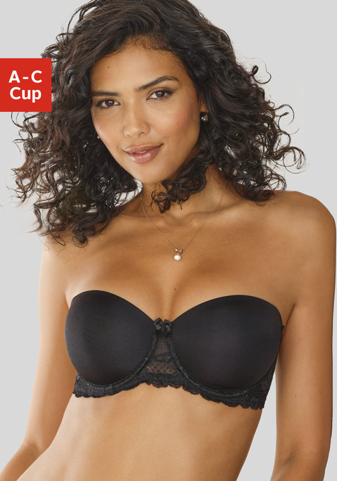 Bild: Schalen-BH von Nuance by Lascana: Zauberhafter Schalen-BH mit Bügel und abnehmbaren Spitzen-Trägern. Die glatten, schlichten Cups sind nahtlos vorgeformt und zeichnen sich auch unter eng anliegender Kleidung nicht ab. Die Rückenteile und die vordere Mitte sind aus dekorativer, elastischer Jacquardspitze gearbeitet. Ein rutschfestes Silikonband sorgt für ein sicheres Tragegefühl und verhindert lästiges Rutschen. Dank der abnehmbaren Träger bietet der BH zwei verschiedene Tragevarianten: tragen Sie ihn je nach Bedarf mit eleganten Außenträgern oder trägerlos zu eleganten Kleidern oder Bandeau Oberteilen. Auch transparente Träger (siehe Artikelnummer 470018) können zu diesem BH kombiniert werden: einfach in den Schlaufen einhaken. Träger und Rückenverschluss sind hinten verstellbar. Klassische Dessous. Bequeme Alltags-Dessous. Modische Dessous. Sexy Dessous. Spitzen-Dessous. Romantische Dessous. Verspielte Dessous. Der Bügel-BH ist aus 80% Polyamid, 20% Elasthan. BHs sind nicht trocknergeeignet, da die Versteller und Ringe durch die Hitze beschädigt werden und brechen.