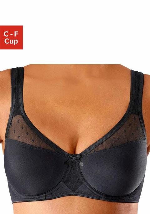 Bild: Minimizer-BH von Nuance: Die besondere Schnittführung lässt die Büste kleiner wirken. Nahtlos vorgeformte, unwattierte Cups. Netzeinsätze im Obercup. Breitere, leicht gefütterte Träger. Träger und Rückenverschluss verstellbar. Der Minimizer-BH ist aus 71% Polyamid, 29% Elasthan.