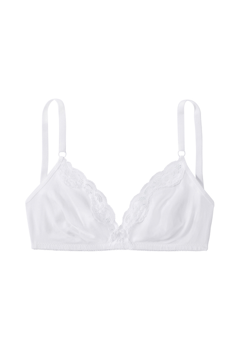 Bild: Bralette-BH von petite fleur: Der BH ohne Bügel von Petite Fleur verbindet Beqemlichkeit mit fraulicher Optik. Er ist aus weicher, anschmiegsamer Baumwolle gefertigt, die sich angenehm trägt. Die nahtlos vorgeformten, ungefütterten Cups des Bralettes sind an der Cupkante mit zarter Jacquardspitze verziert. Besonders zierliche Schnittform in leichter Triangel Optik und schmales Rückteil. Im günstigen Doppelpack erhältlich. Träger und Rückenverschluss sind verstellbar. Besonders für kleine Größen geeignet. Der BH ist aus 90% Baumwolle, 5% Polyamid, 5% Elasthan.