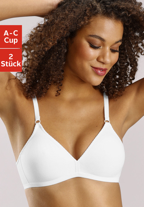 Bild: Soft-BH von petite fleur by Lascana: BH ohne Bügel in der praktischen 2er- Packung. Wahlweise in 2x weiß oder 2x schwarz. Nahtlos vorgeformte Cups eignen sich ideal um unter eng anliegender Kleidung getragen zu werden. Träger und Rückenverschluss verstellbar.Passformhinweis: Der BH fällt klein aus, bitte bestellen Sie den BH eine Größe größer, z. B. statt 70 Cup A bitte 75 Cup A bestellen. Aus 93% Baumwolle, 7% Elasthan.