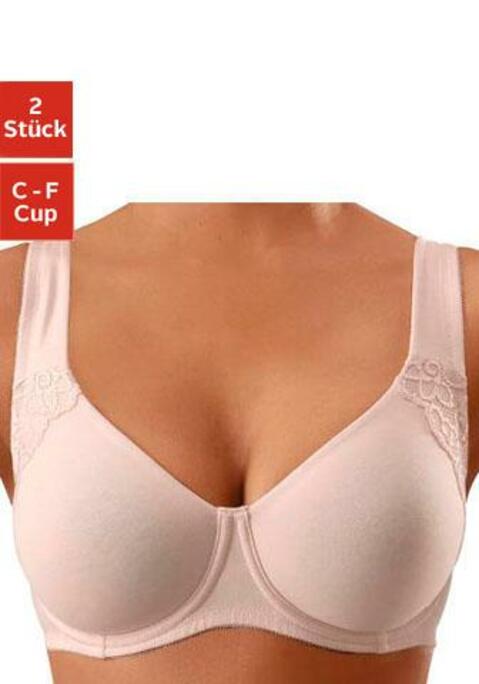 Bild: Minimizer-BH von petite fleur: Doppellagig vorgeformte Cups ohne Wattierung. Breitere Komfortträger. Durch die besondere Schnittführung wirkt das Cup optisch kleiner. Träger und Rückenverschluss verstellbar. Der BH ist aus 85% Baumwolle, 10% Polyamid, 5% Elasthan. BHs sind nicht trocknergeeignet, da die Versteller und Ringe durch die Hitze beschädigt werden und brechen.
