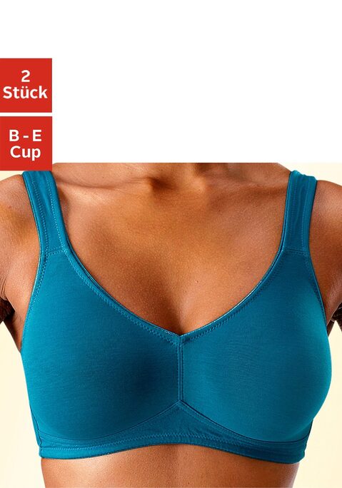 Bild: Soft-BH von petite fleur: Toller Basic BH ohne Bügel von Petite Fleur im Doppelpack. Die nahtlos vorgeformten, unwattierten Cups schmiegen sich sanft an und sind ideal für eng anliegende Kleidung, da sich nichts abzeichnet. Die breiteren Träger geben verlässlichen Halt und verhindern ein unangenehmes Einschneiden auf den Schultern. Mit steigender Größe ist die Passform auf die jeweiligen besonderen Bedürfnisse abgestimmt, d.h. pro Größe wachsen auch die Rückteile und Verschlussbreiten mit. Für hohen Tragekomfort sorgen breitere Elastikbänder entlang der Kanten, die dank hochelastischer Nähte nicht einschneiden. Träger und Rückenverschluss sind verstellbar.  Aus 95% Baumwolle, 5% Elasthan. <br/><br/> BHs sind nicht trocknergeeignet, da die Versteller und Ringe durch die Hitze beschädigt werden und brechen.