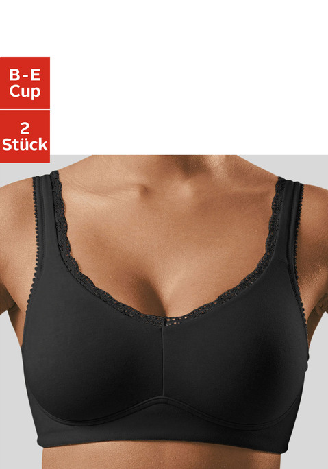 Bild: Soft-BH von petite fleur: Basic-BH ohne Bügel (ohne Wattierung) von Petite Fleur im günstigen Doppelpack. Aus weicher, trageangenehmer Baumwolle mit zarter Spitzenkante am Dekolleté und an den Trägern. Breitere wattierte Träger für einen hohen Tragekomfort bis in große Größen. Träger und Rückenverschluss verstellbar.  Der BH ist aus 85% Baumwolle, 10% Polyamid, 5% Elasthan. BHs sind nicht trocknergeeignet, da die Versteller und Ringe durch die Hitze beschädigt werden und brechen.
