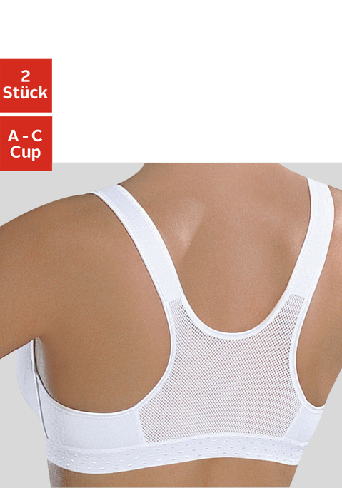 Bild: Sport-BH von petite fleur: Sport-BH von Petite Fleur ohne Bügel in vollelastischer Qualität. Praktische Schlupfform. BH mit unwattierten Cups. Der Sport-BH ist aus 75% Baumwolle, 15% Elasthan, 10% Polyester. Leichte Belastbarkeit, geeignet für Yoga und Gewichtstraining.