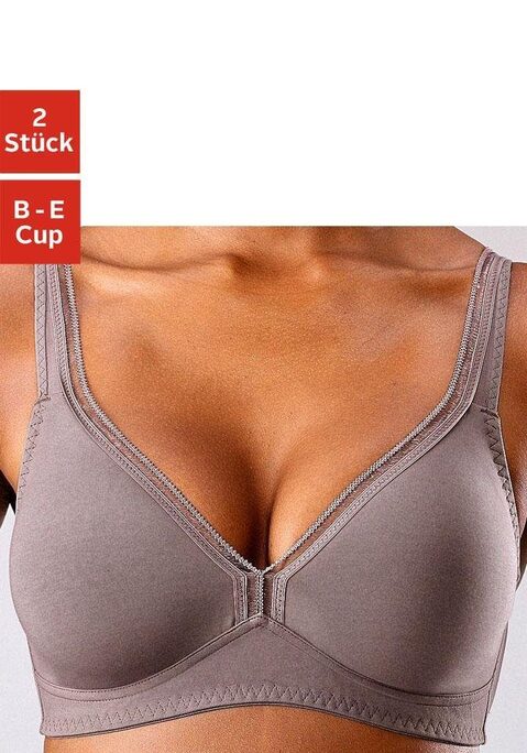 Bild: T-Shirt-BH von petite fleur: Der bequeme T-Shirt BH ohne Bügel von Petite Fleur schmiegt sich sanft der Haut an und vereint pures Design mit optimaler Passform. Die  nahtlos vorgeformten Cups (ohne Wattierung) umschließen die Brust sicher und ermöglichen gleichzeitig ein besonders angenehmes Tragegefühl. Die bequeme Baumwollqualität sorgt für ein samtweiches Gefühl auf der Haut.Eine hübsche Zierkante am Dekoleté verleiht dem zeitlos schlichten Look des Petite Fleur BHs eine besondere Note. Die elastischen und verstellbarenTräger sowie der verstellbare Rückenverschluss sorgen für einen bequemen Sitz. Toller Mieder-BH im praktischen 2er Pack aus 93% Baumwolle und 7% Elasthan. Klassische Dessous. Bequeme Alltags-Dessous. Modische Dessous. BHs sind nicht trocknergeeignet, da die Versteller und Ringe durch die Hitze beschädigt werden und brechen.