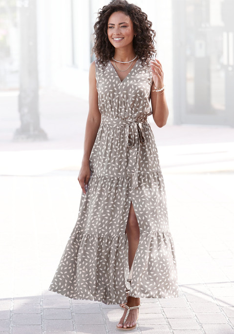 Bild: Maxikleid von Vivance: Maxikleid mit Alloverprint von Vivance. Mit V-Ausschnitt. Ärmellos. Gummizug in der Taille. Rockteil mit Stufen und Saumschlitz. Trageangenehme Webware.