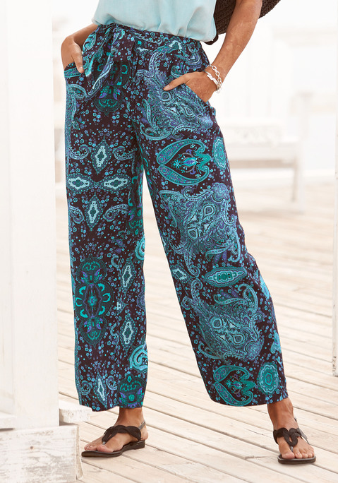 Bild: Palazzohose von Vivance: Allover bedruckte Schlupfhose von Vivance. Jedes Teil ein Unikat. Schlupfbund mit Bindegürtel. Seitliche Eingrifftaschen. Perfekt im Urlaub und am Strand. Glatte, gewebte Qualität.